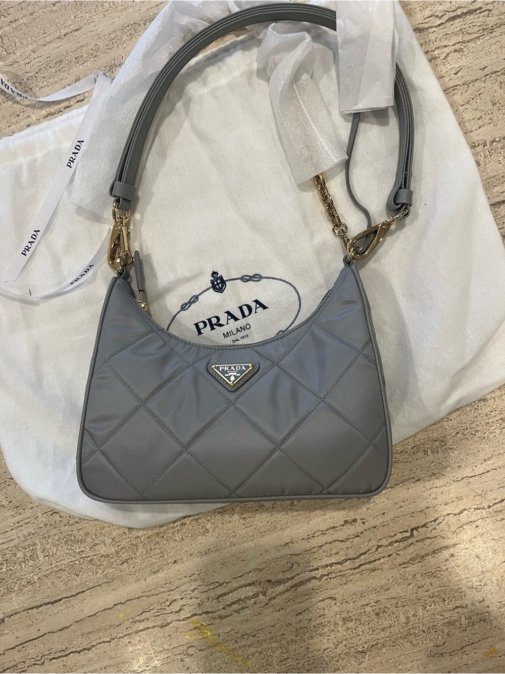 Prada Re-Edition Quilted Re- Nylon Mini Shoulder Bag 
Light Grey